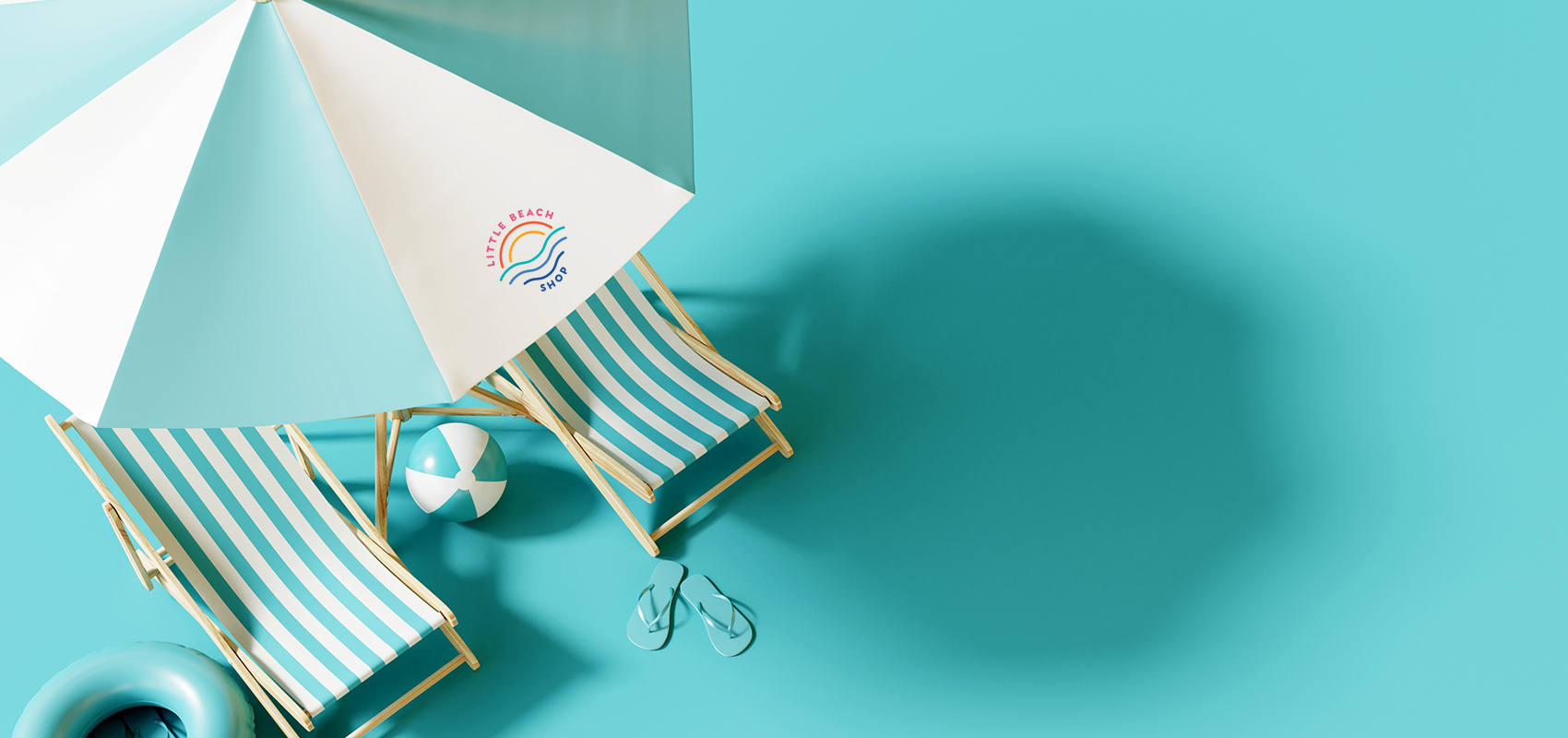 aqua and white beach umbrella and beach product branding